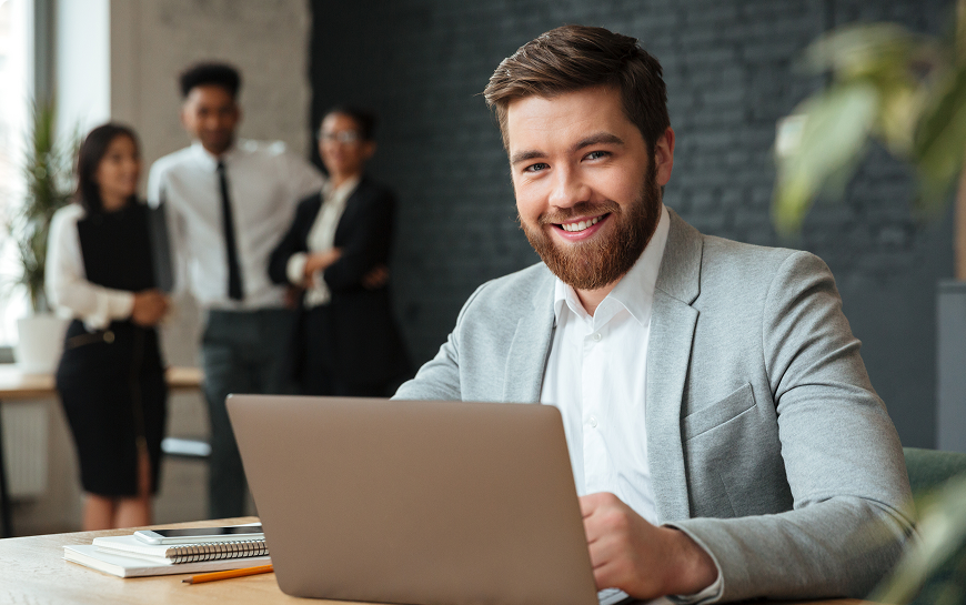 Business professional using laptop
